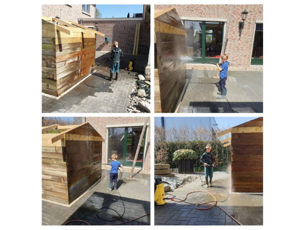 Het huisje wordt schoongespoten, zodat we kunnen beginnen met de afwerking Het huisje wordt schoongespoten, zodat we kunnen beginnen met de afwerking